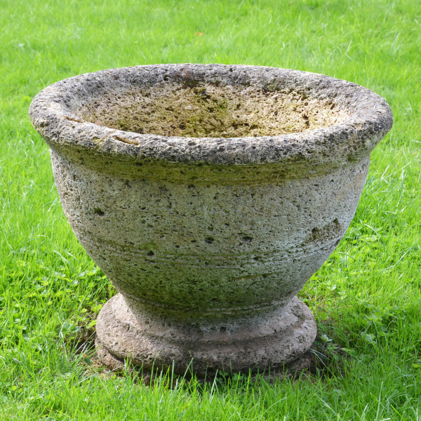 A circular stone planter