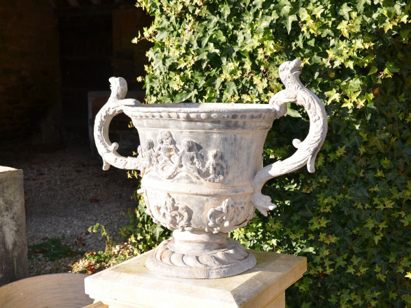 A large pair of lead urns