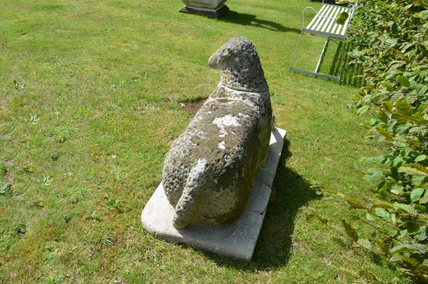 A large carved natural Bath stone Folk Art sheep