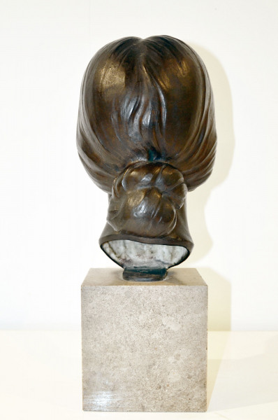 A bronze portrait bust of a young women by Herbert Palliser 1883-1963