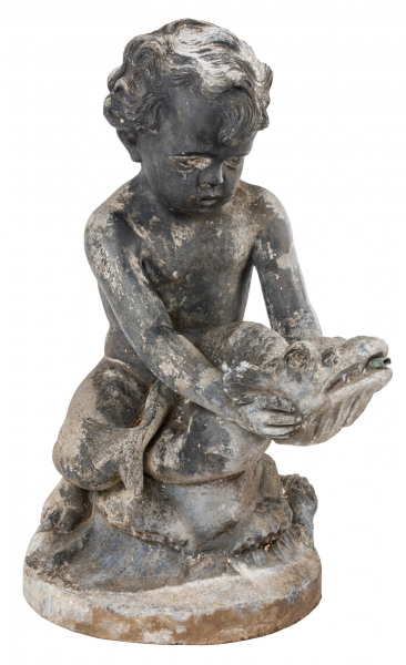  An early 20th century lead fountain in the form of a boy holding a fish