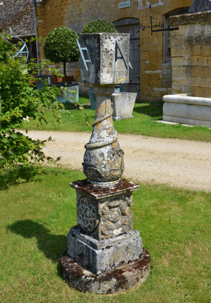 A Victorian carved stone multi-faceted sundial