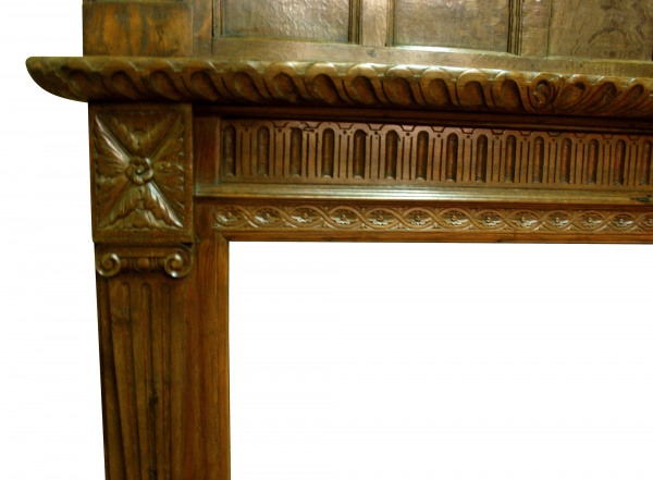 A late 19th century Oak fire surround partially made up from period elements