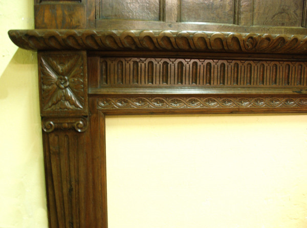 A late 19th century Oak fire surround partially made up from period elements