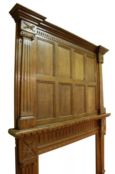 A late 19th century Oak fire surround partially made up from period elements
