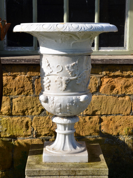 A fine pair of late 19th century Italian white marble urns
