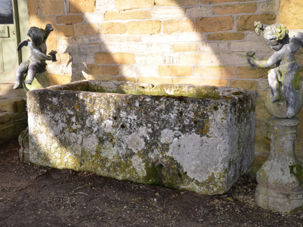 A large antique limestone trough