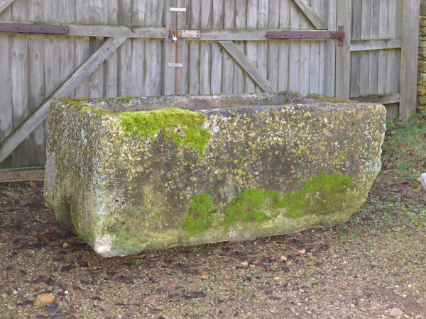 A large antique limestone trough