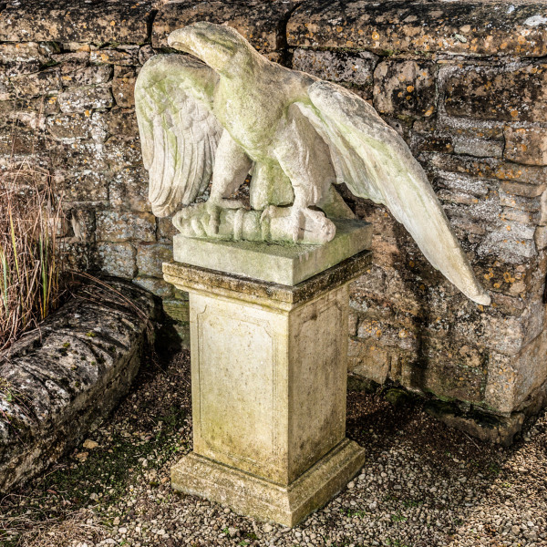 A pair of impressive carved stone eagles