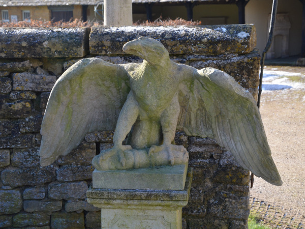 A pair of impressive carved stone eagles