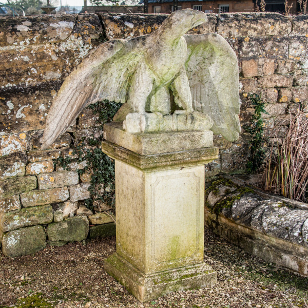 A pair of impressive carved stone eagles