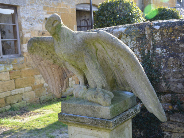 A pair of impressive carved stone eagles