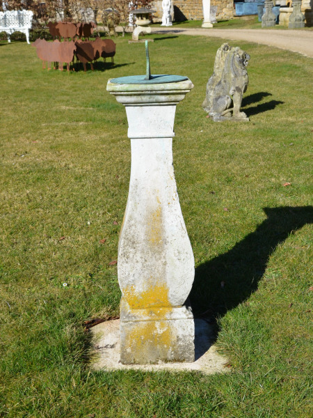An elegant Georgian Portland stone sundial