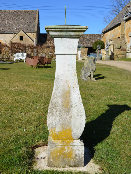 An elegant Georgian Portland stone sundial