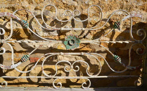 An early 20th century carved limestone garden seat