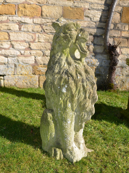 A pair of 19th century carved Bath stone griffins