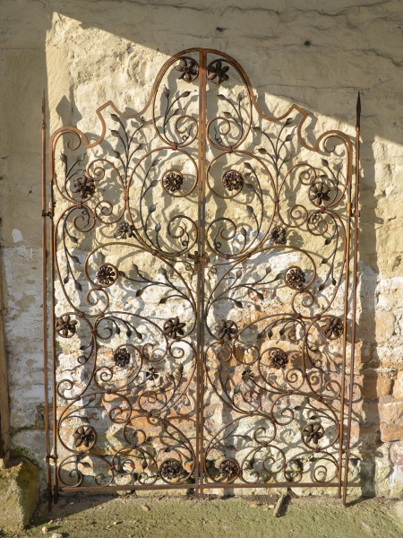 A pair of decorative ironwork gates