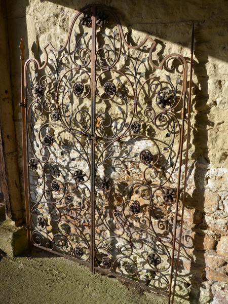 A pair of decorative ironwork gates