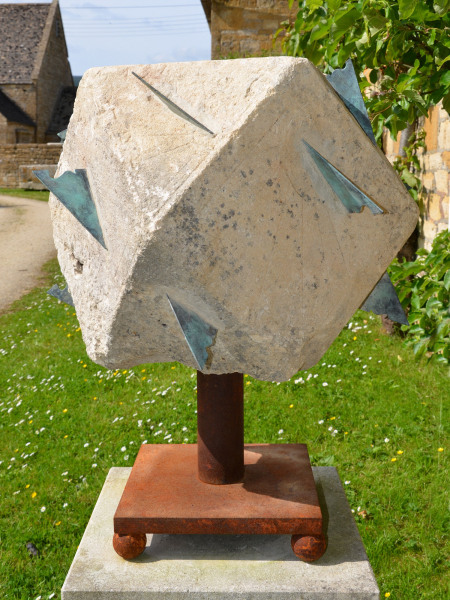 A large 18th century polyhedral limestone sundial