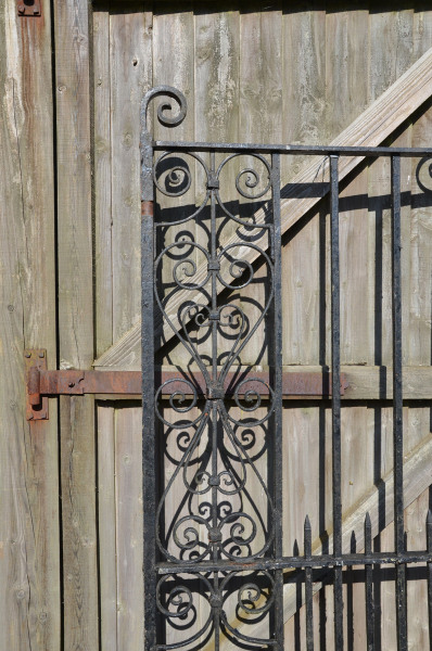 A pair of early 20th century wrought iron entrance gates