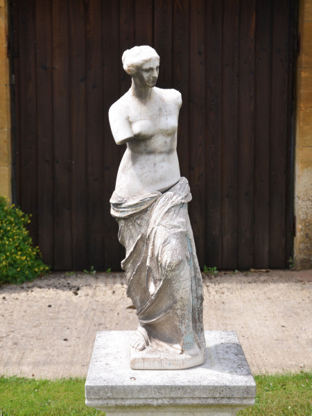 An alabaster figure of the 'Venus de Milo'