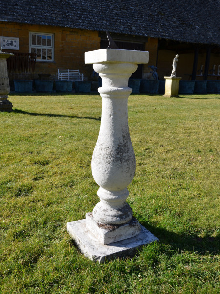 A Portland stone baluster sundial
