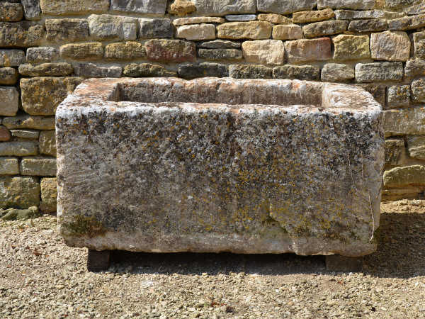 An 18th century limestone trough with good weathering and patination
