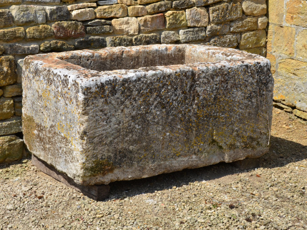 An 18th century limestone trough with good weathering and patination
