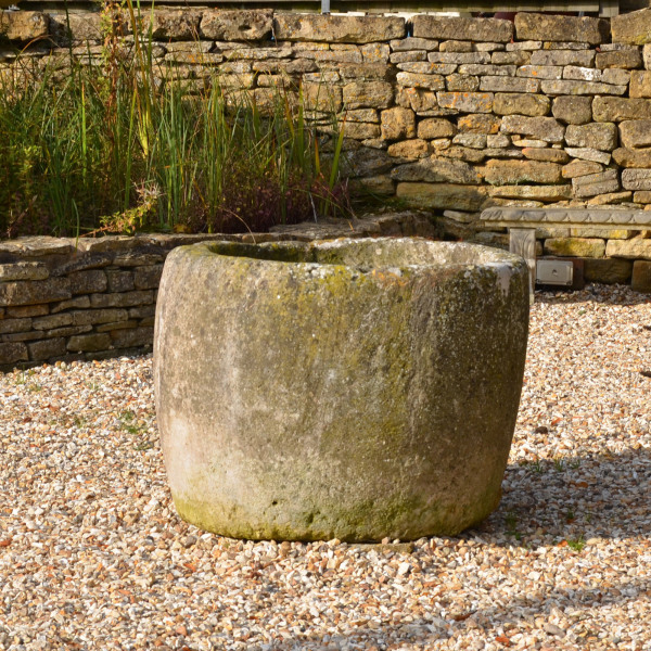 A large antique circular trough with good weathering and patination