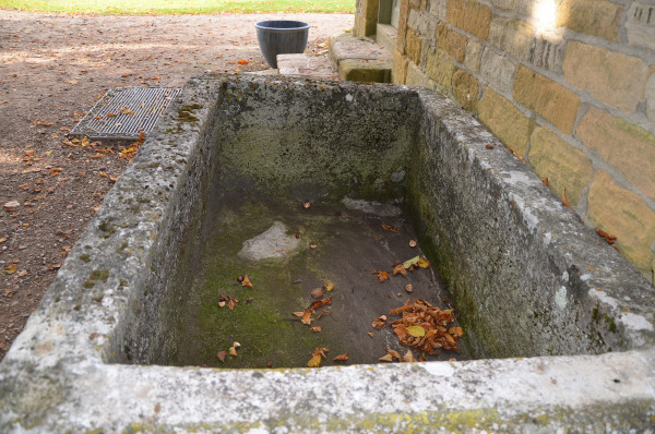 A large antique limestone trough with good weathering and patination