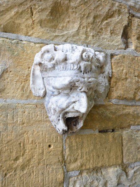 A 19th century Italian marble water spout in the form of Pan