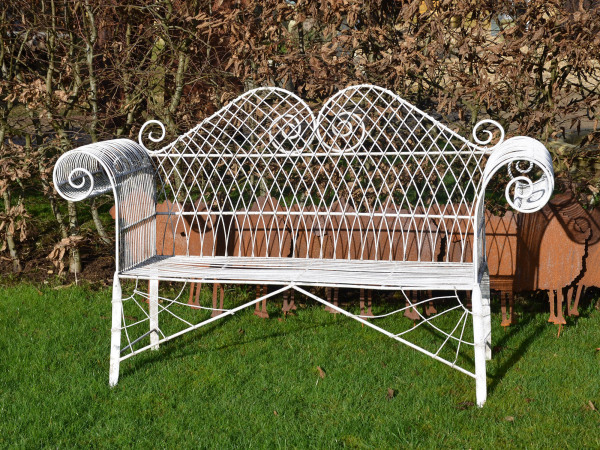 A decorative mid 20th century wirework garden bench