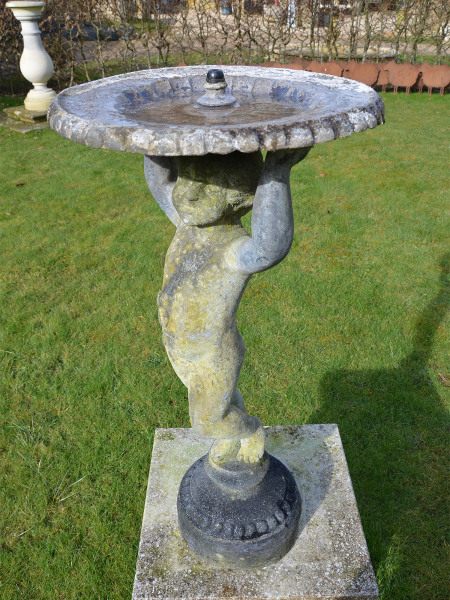A mid-20th century lead birdbath/fountain 