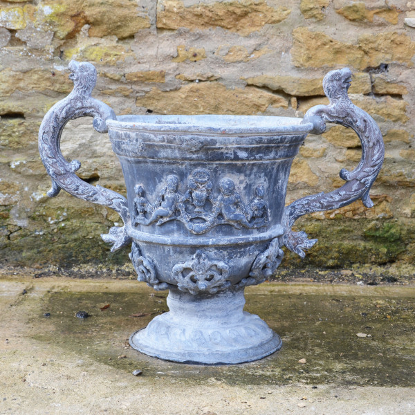 A pair of large early 20th century lead urns