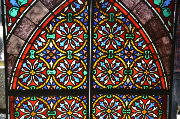 A pair of 19th century stained and painted glass windows